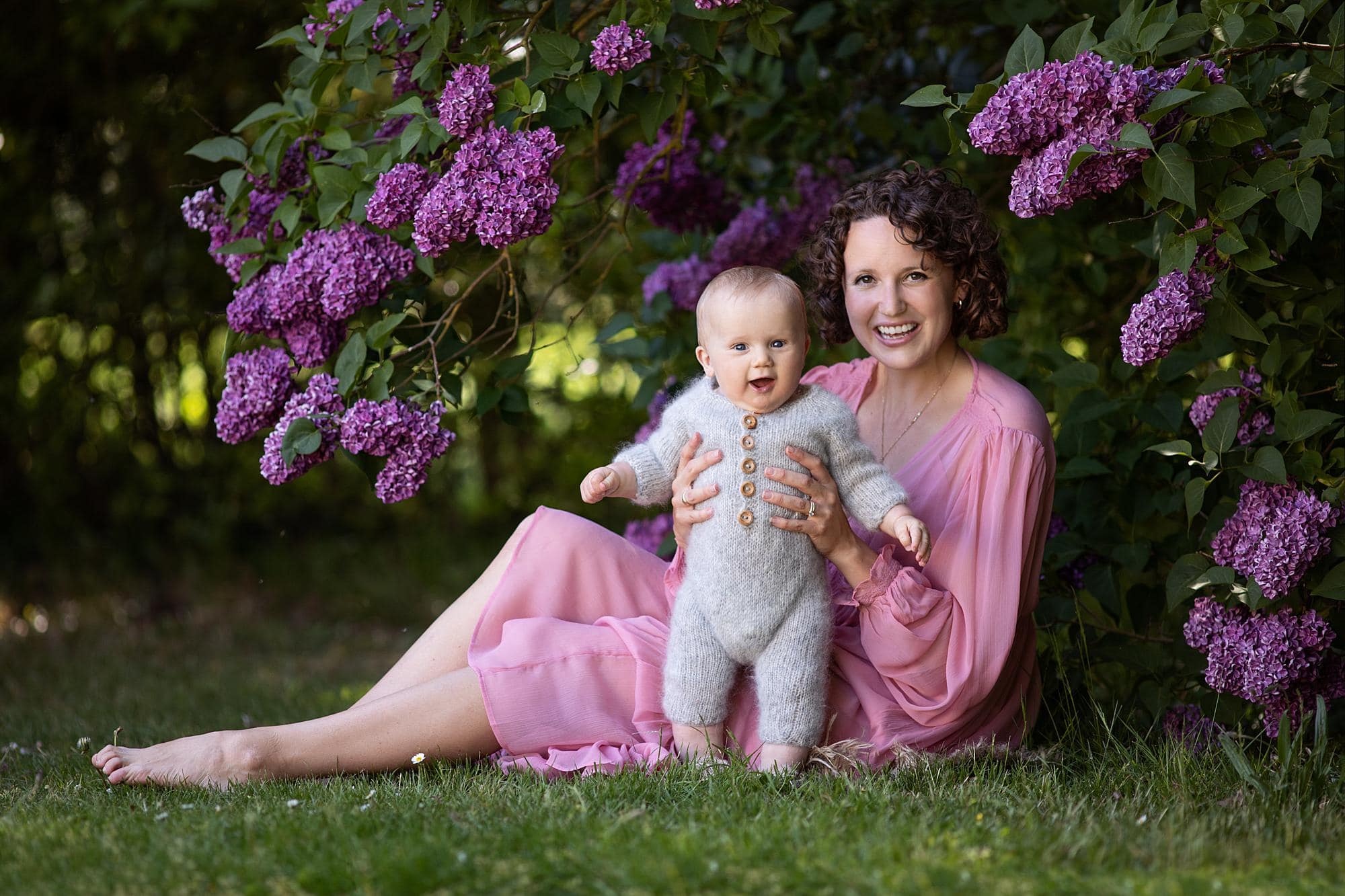 Mother and Baby photographed under a lilac bush by Alison McKenny