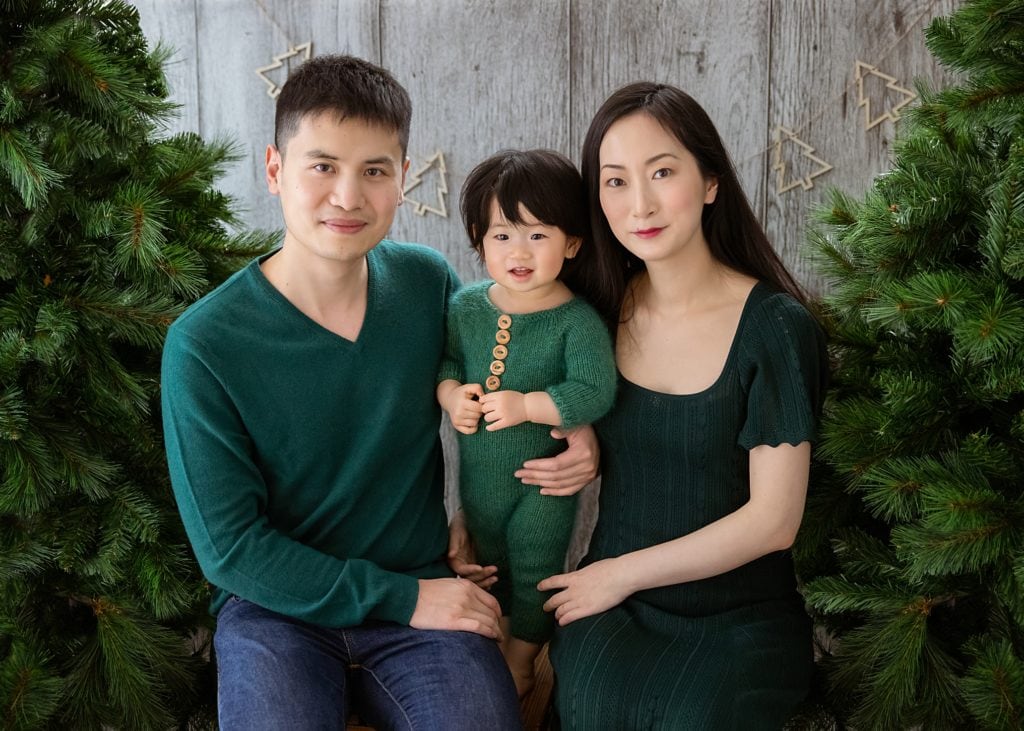 Family posing for a Christmas Family Portrait 