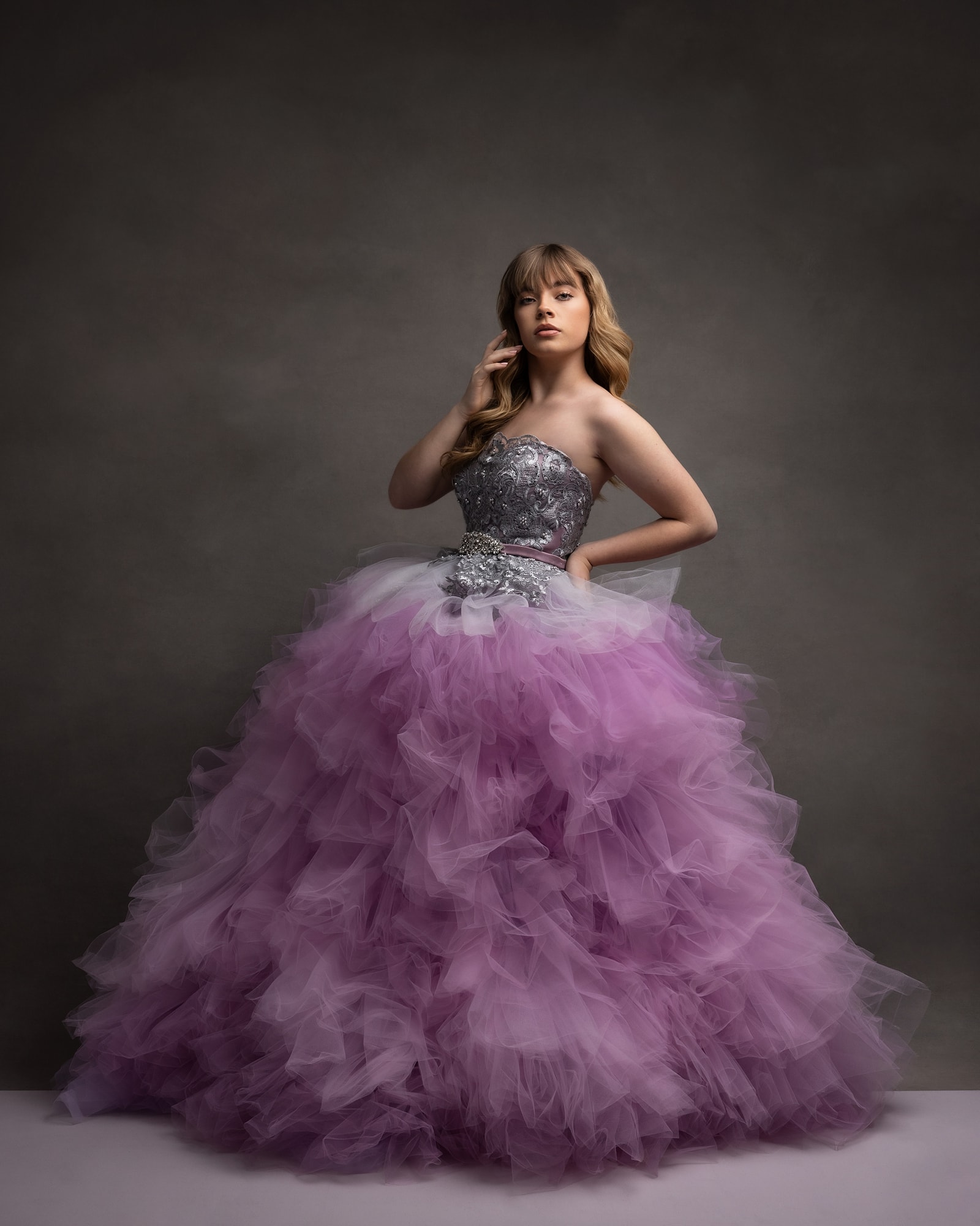 Teenage girl in a purple tulle dress