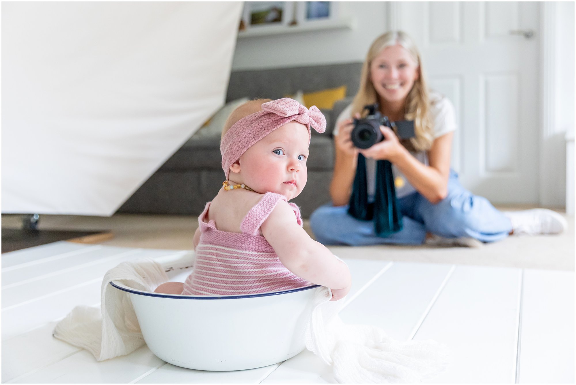 behind the scenes photo of Alison McKenny Photographing a Baby
